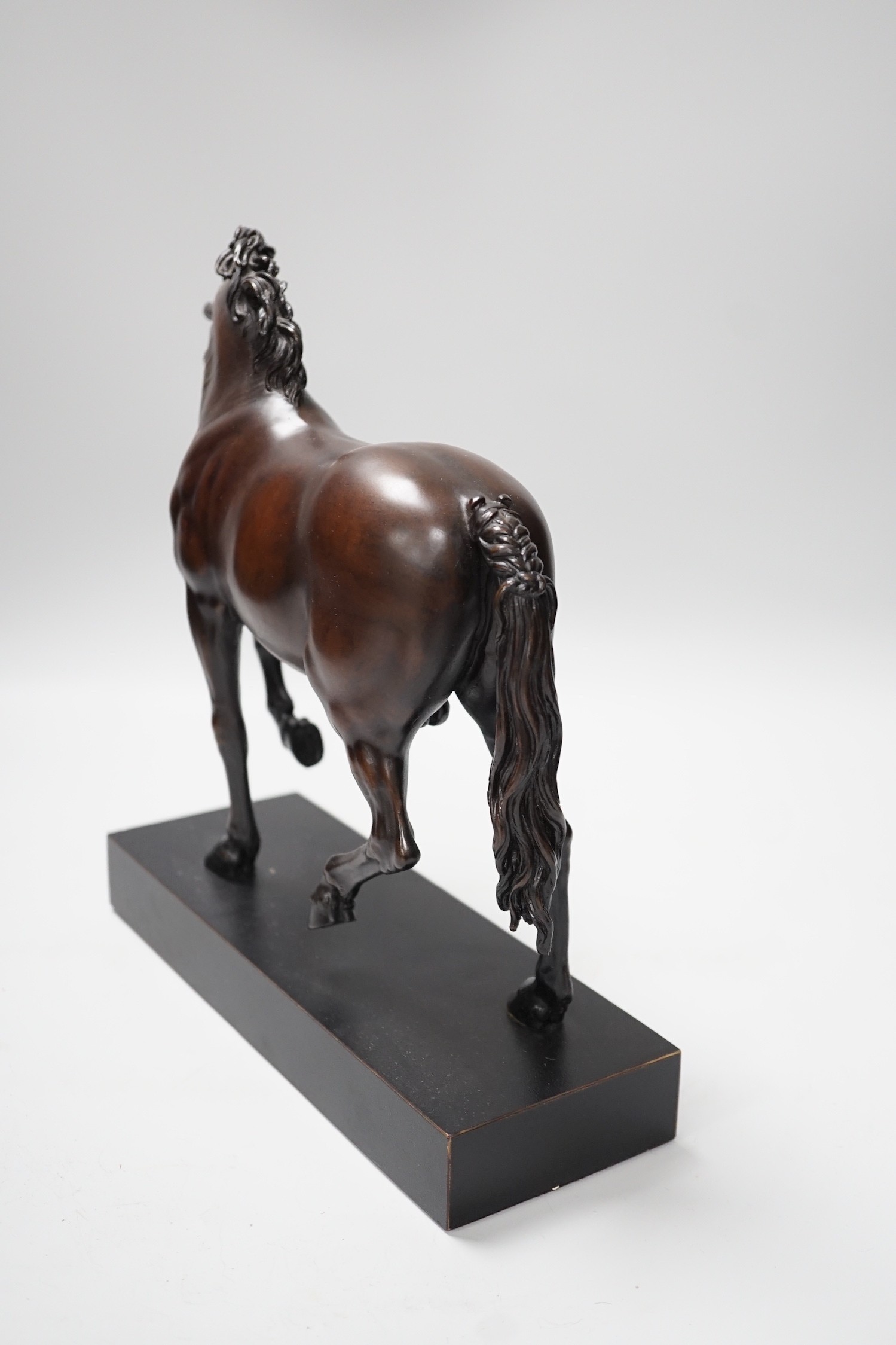 A reproduction bronzed figure of a horse, together with a column desk lamp, 53cm tall excl. light fighting